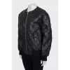 Leather jacket with tag