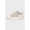 Sneakers with leather toe