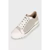 Sneakers with leather toe