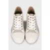 Sneakers with leather toe