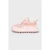 Pink sneakers with a massive sole