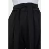 Asymmetrical cut trousers with stripes