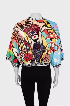 Blouse decorated with elastic
