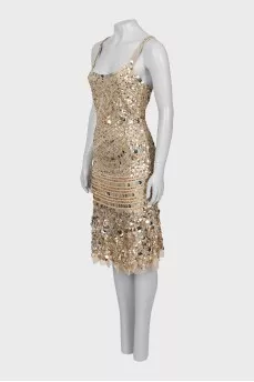 Dress with straps decorated with sequins