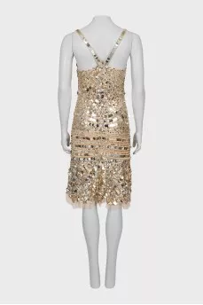 Dress with straps decorated with sequins