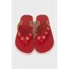 Leather flip flops with eyelet