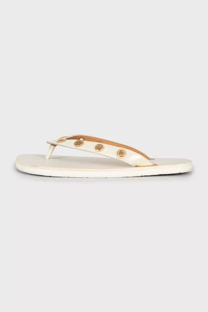 White flip flops with eyelet