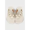 White flip flops with eyelet