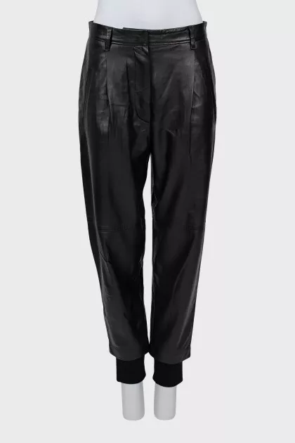 Leather trousers with textile inserts