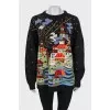 Oversized sweater with embroidery and sequins