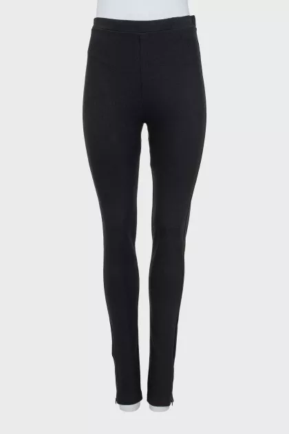 Sports leggings with zippers at the bottom
