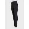 Sports leggings with zippers at the bottom