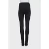 Sports leggings with zippers at the bottom