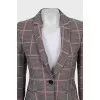 Suit with checkered trousers
