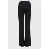 Black flared trousers