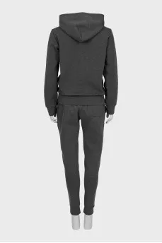 Tracksuit of trousers and a cardigan