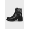 Leather boots with black and white upper