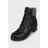 Leather boots with black and white upper