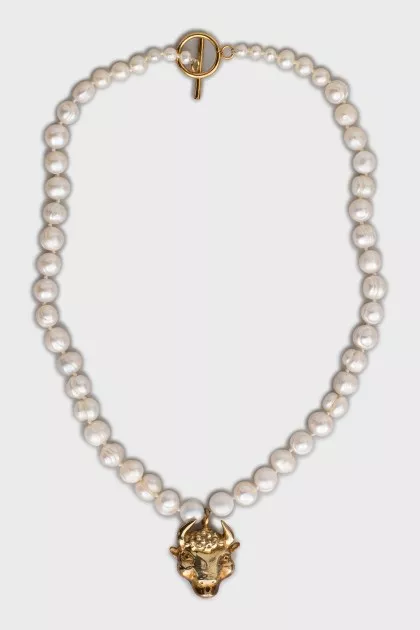 Pearl necklace with a bull pendant