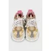 Chain Reaction sneakers with branded logo