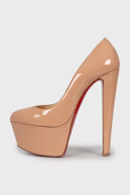 Beige high heel shoes
