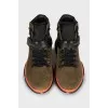 Suede boots with rubber inserts