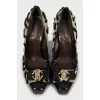 Leather shoes decorated with a bow