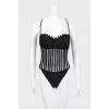 Swimsuit with a transparent insert