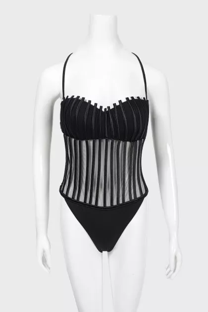 Swimsuit with a transparent insert