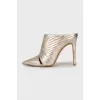 Gold colored leather shoes