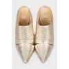 Gold colored leather shoes