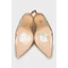 Gold colored leather shoes