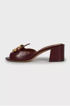 Leather mules with gold logo