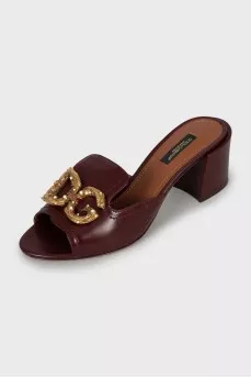 Leather mules with gold logo