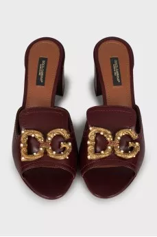 Leather mules with gold logo