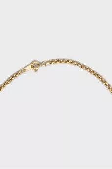 Gold cross pendant