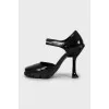 Black leather shoes with square toe