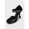 Black leather shoes with square toe
