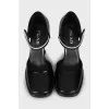 Black leather shoes with square toe