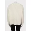 Knitted sweater in white