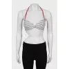 Striped swimsuit with tag