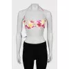 Swimsuit with a bright print and tag