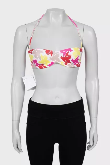 Swimsuit with a bright print and tag