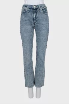 Jeans decorated with lacing