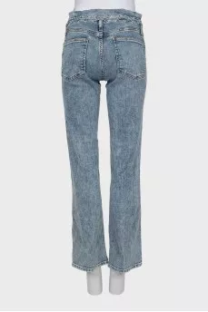 Jeans decorated with lacing