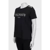 Black T-shirt with silver buttons
