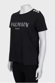 Black T-shirt with silver buttons