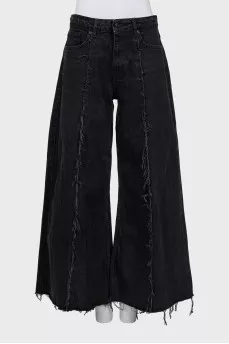 Flared jeans with raw seams