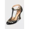 Black and white shoes with geometric print