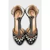 Black and white shoes with geometric print